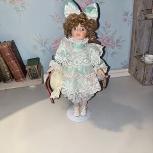 Vintage Style Porcelain Doll with Lace Dress